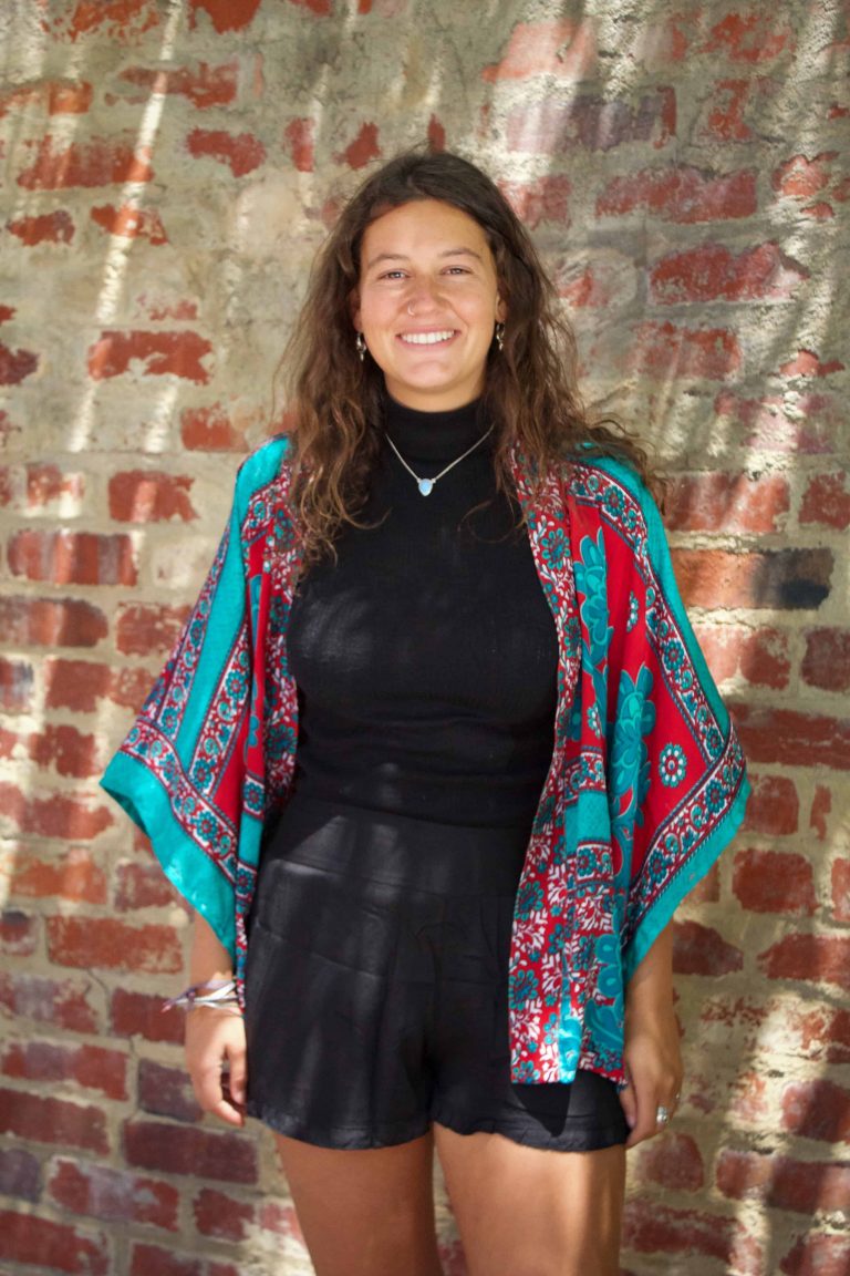 Teal and crimson sari-silk kimono worn over black