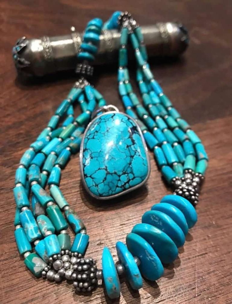 Tibetan turquoise pendant with strands of beaded necklace