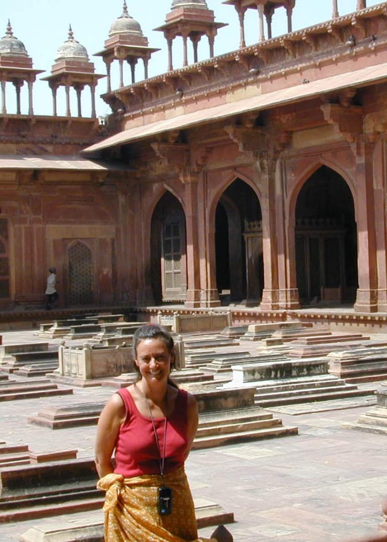 Red sandstone arches of a Mughal courtyard