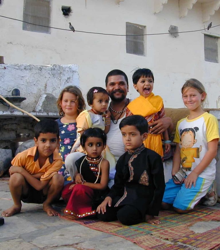 Rooftop full of laughing children posing together
